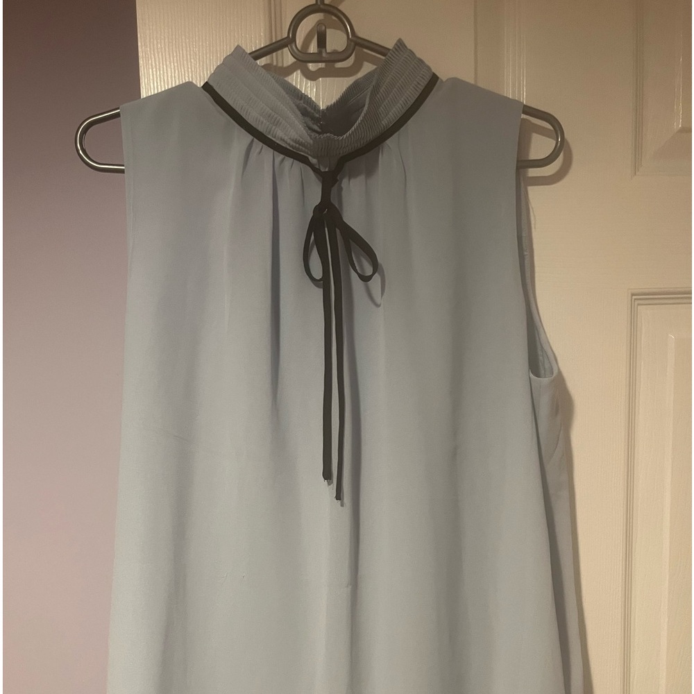Preowned light blue sleeveless KARL LAGERFELD blouse SIZE LARGE